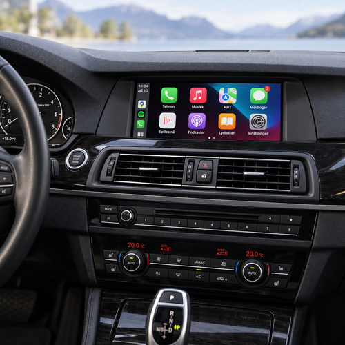 Integrert skjerm i BMW 5-serie F10/F11 med Apple CarPlay-meny over bilens originale radio.