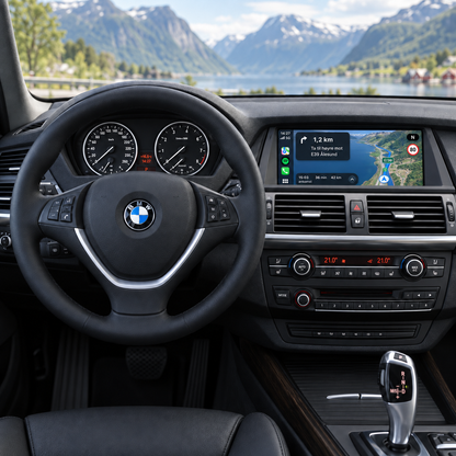 CarPlay-skjerm i BMW X5 E70/X6 E71 med kart og ruteveiledning mot E39 Ålesund.